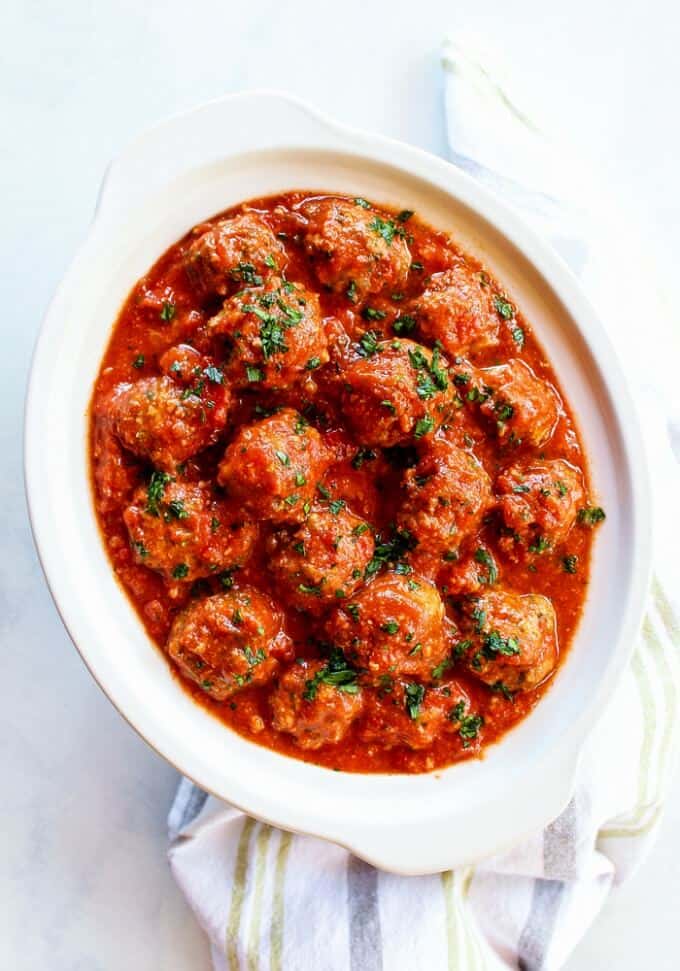 Turkey meatballs in marinara on white plate