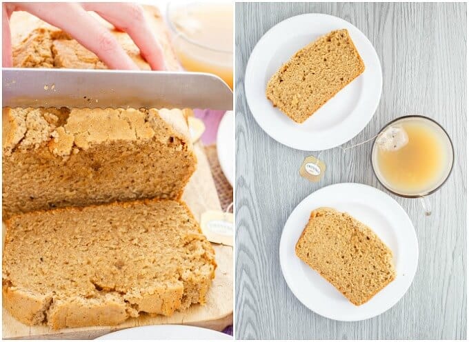 Earl Grey Tea Bread  being sliced by knife held by hand on wooden pad. Bread slices on white plates with cup of tea on gray table