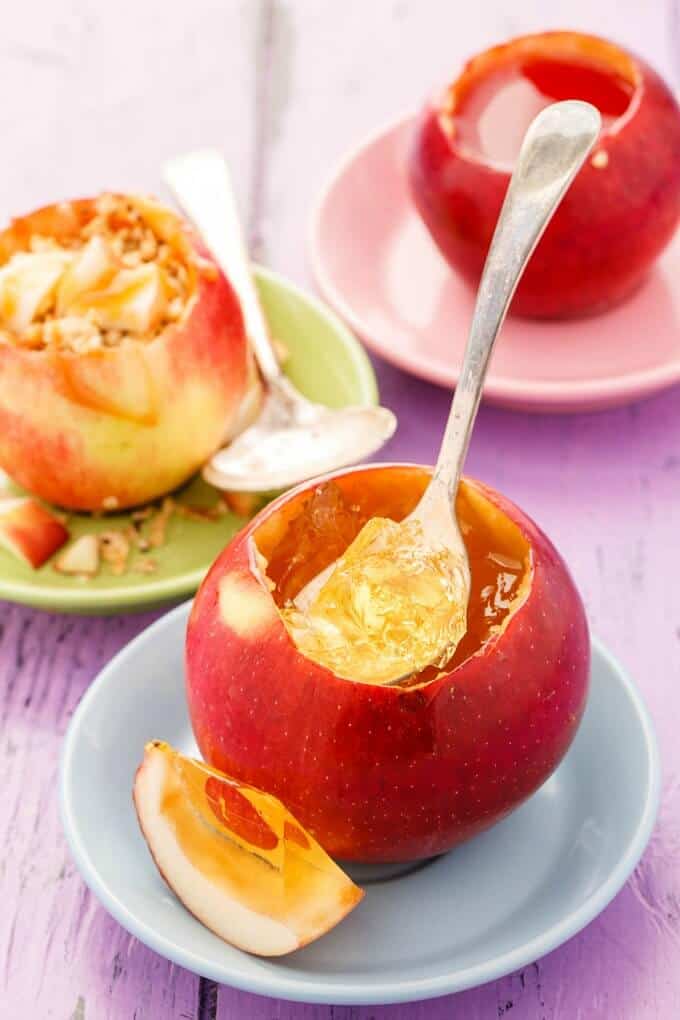 Edible Apple Cups  on colorful small plates with spoon on purple table