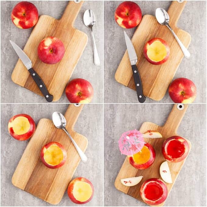 Edible Apple Cups being carved out on wooden pad with knife and spoo than filled with liquor and small umbrella