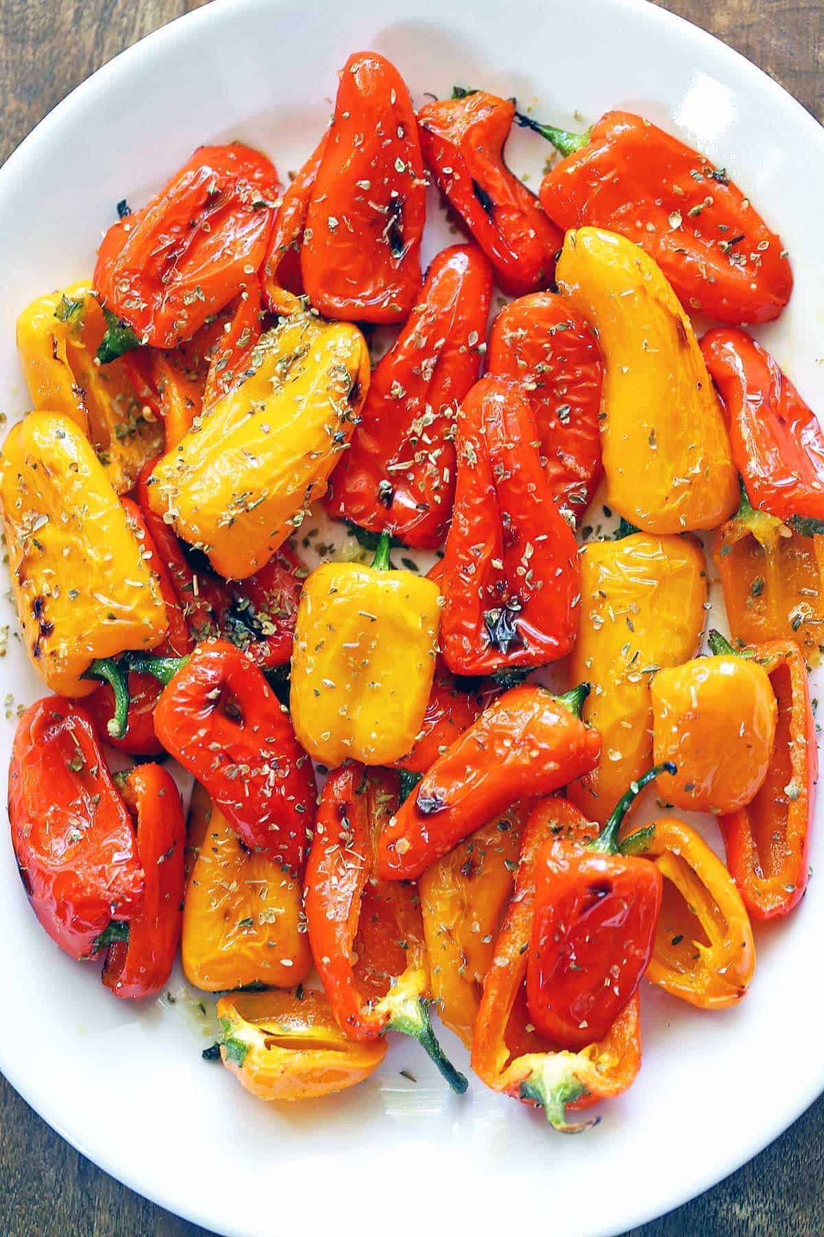 Delicious Roasted Mini Sweet Peppers in a white plate.