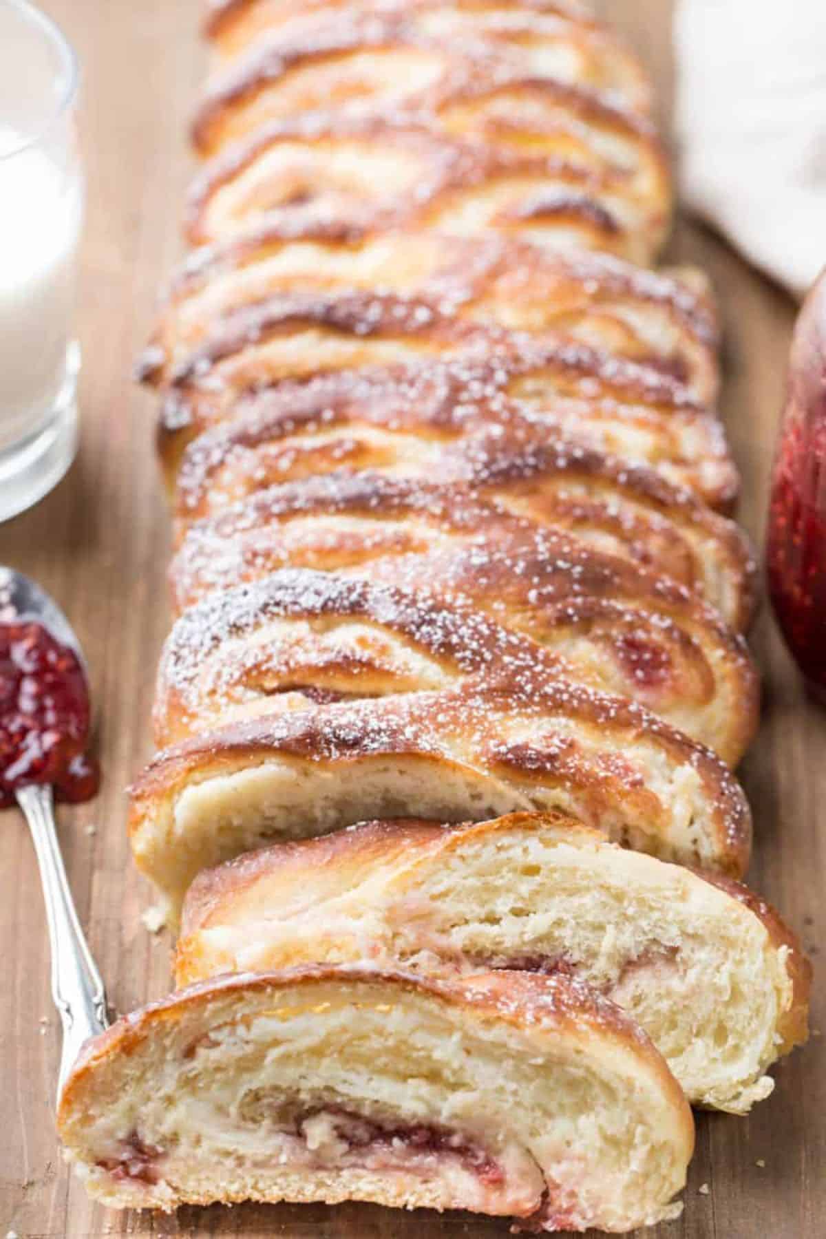 Sliced Twisted Sweet Bread on a wooden cutting tray.