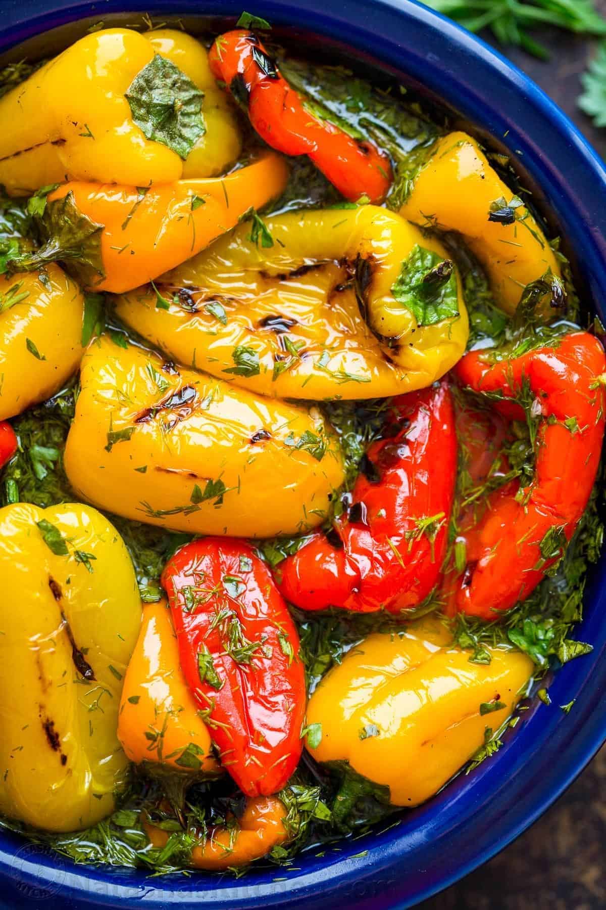 Juicy Marinated Mini Sweet Peppers in a blue bowl.