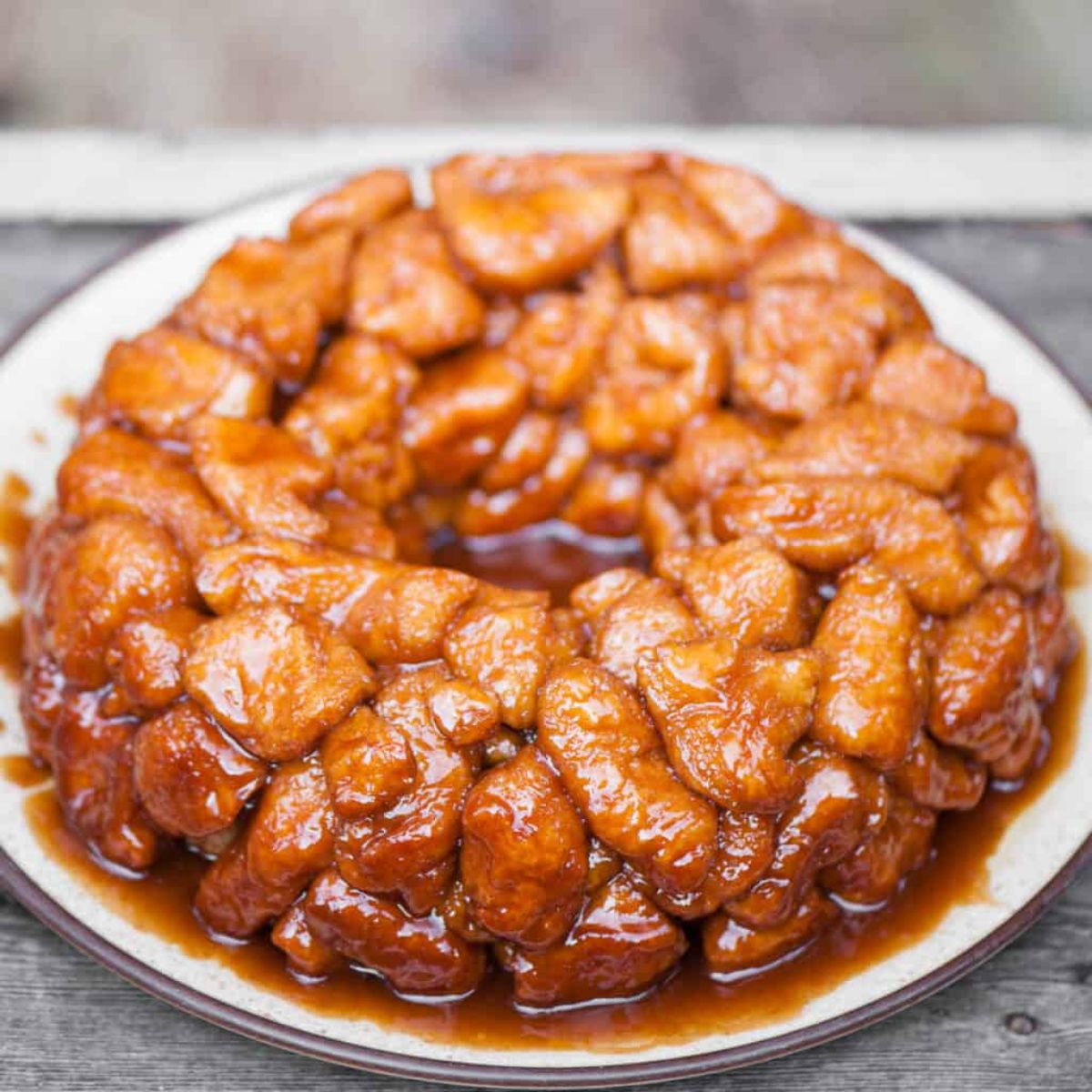 Mouth-watering Granny's Monkey Bread on a white plate.