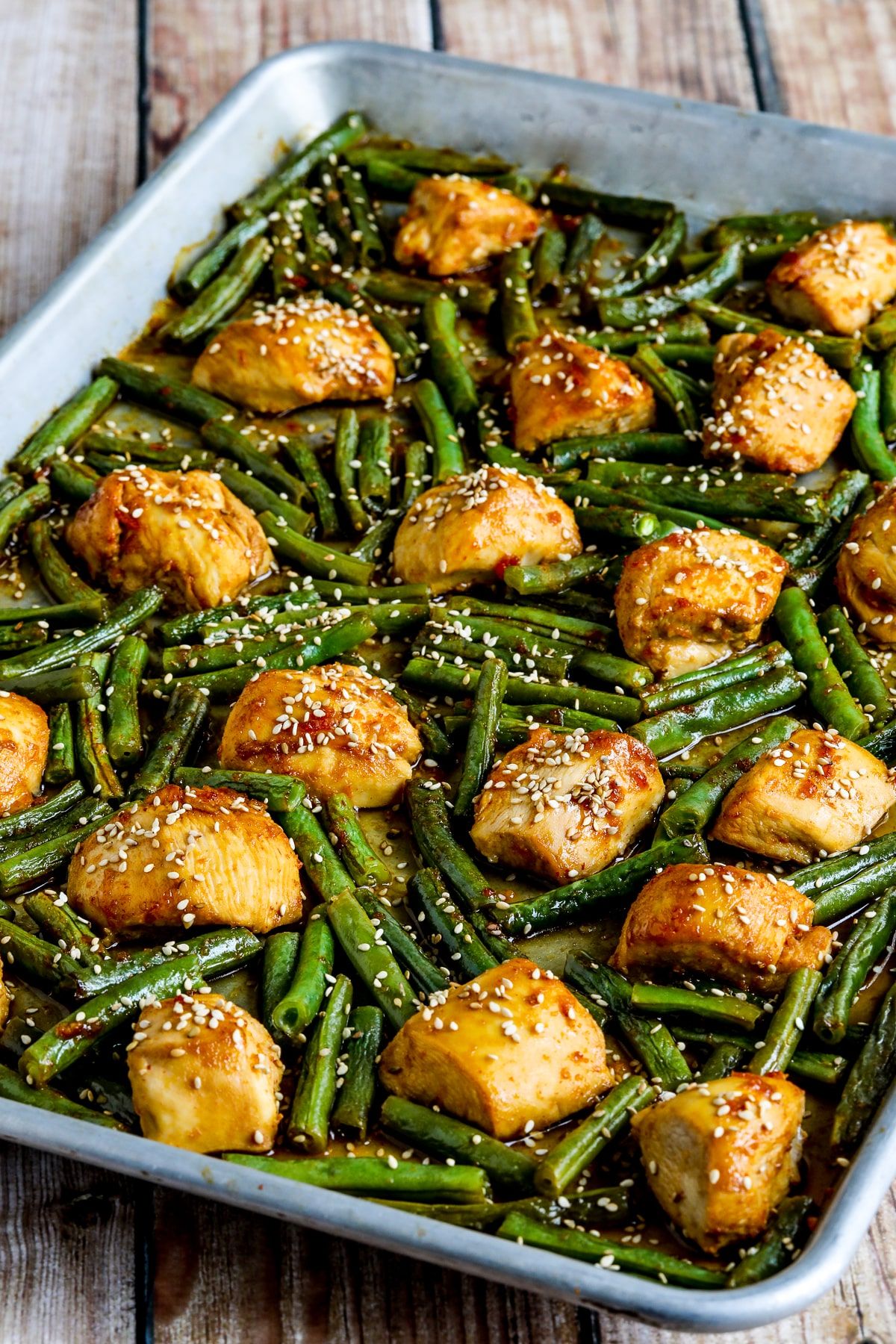 Mouth-watering Asian Chicken and Green Beans Sheet Pan Meal.