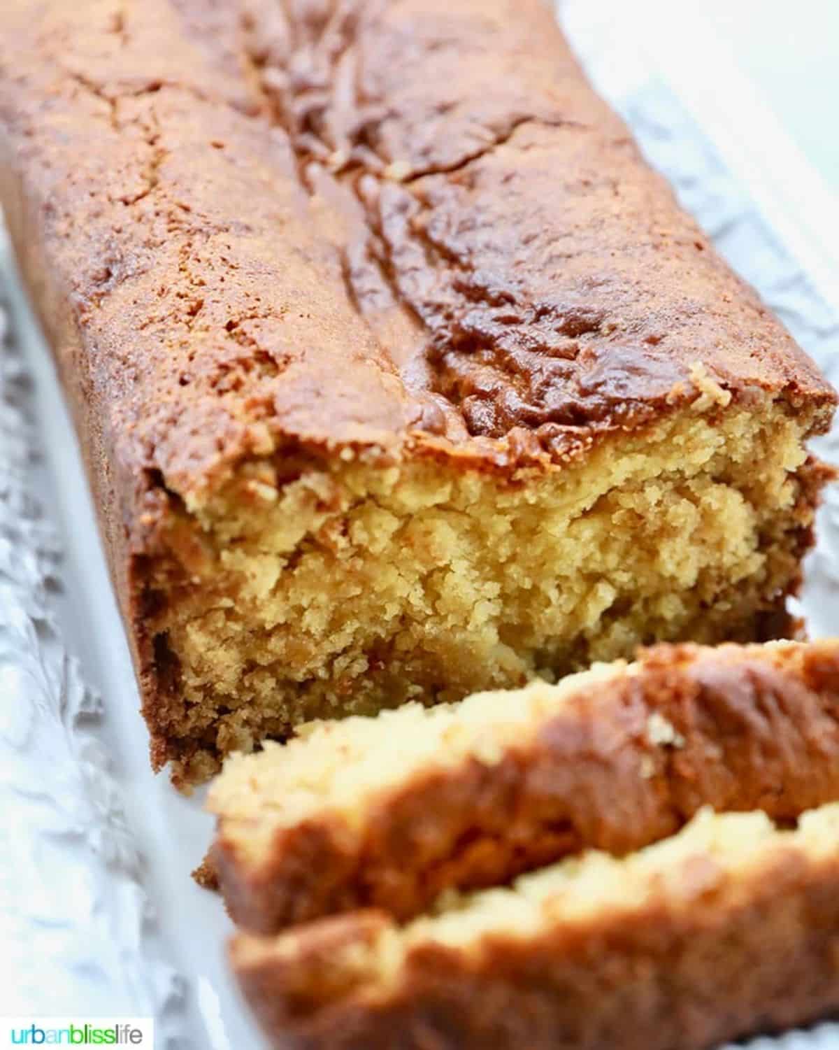 Partially sliced Pineapple Bread on a tray.