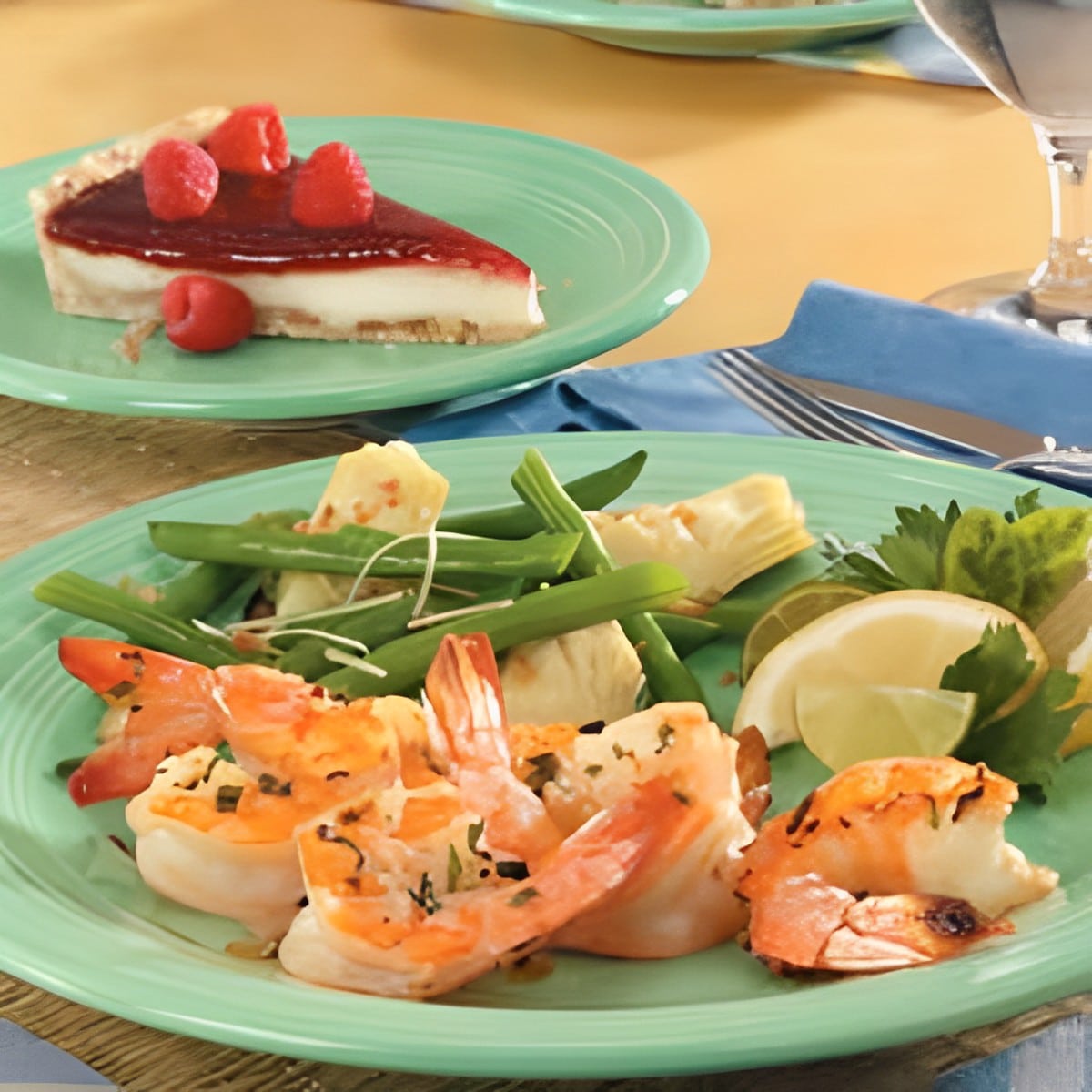 Delicious Artichokes and Green Beans on a green plate.