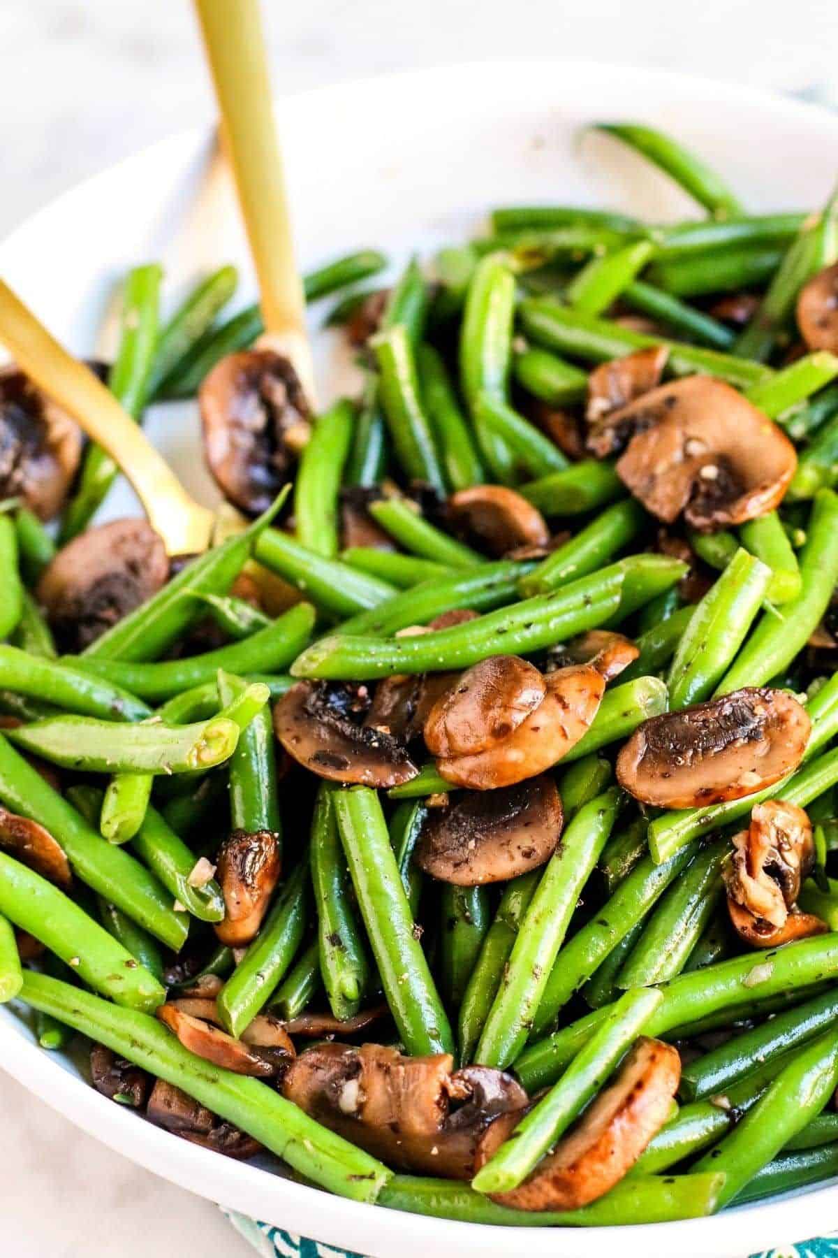 Tasty Green Beans and Mushrooms in a white bowl.