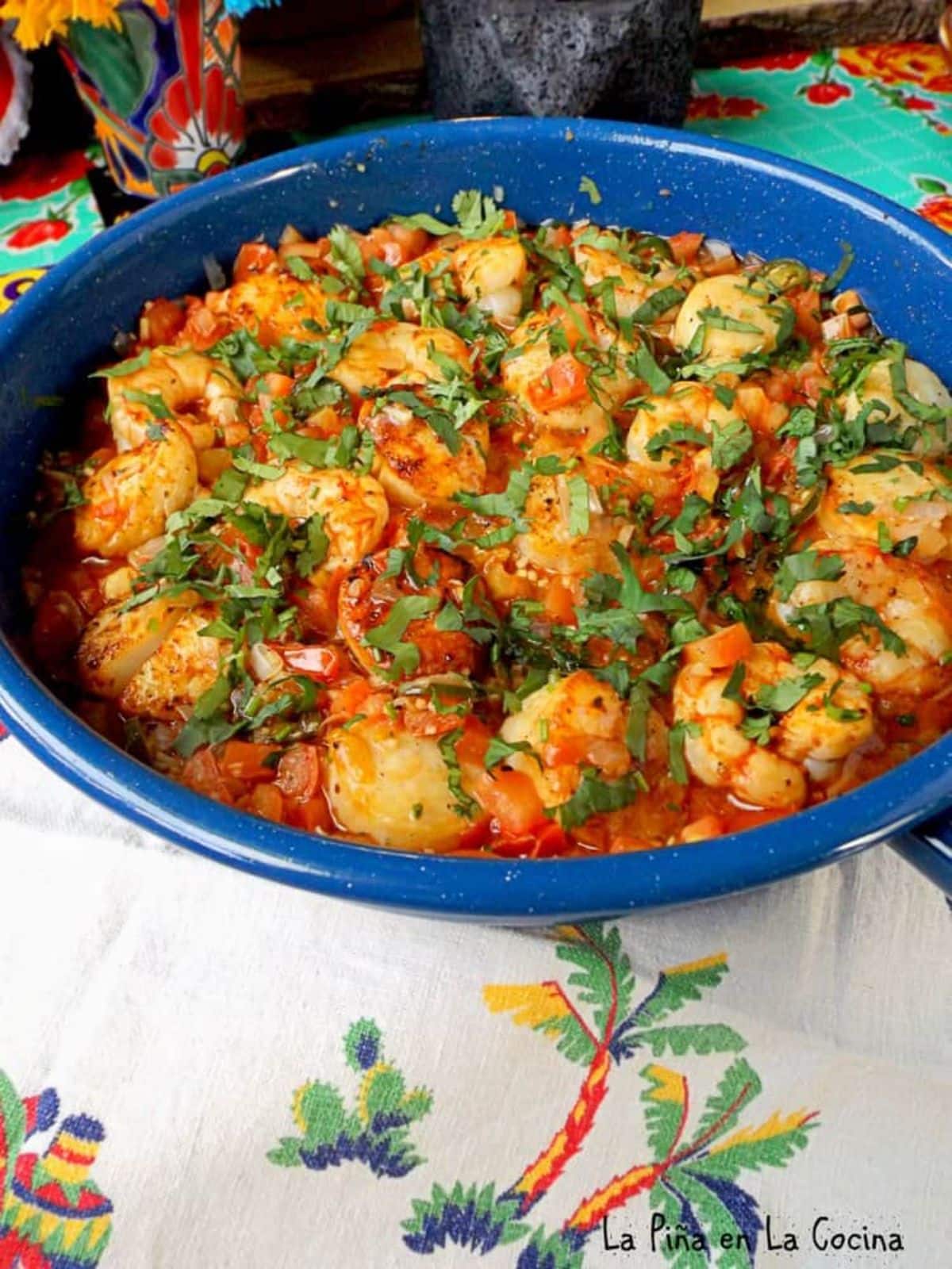 Juicy Shrimp and Scallops a la Mexicana in a blue bowl.