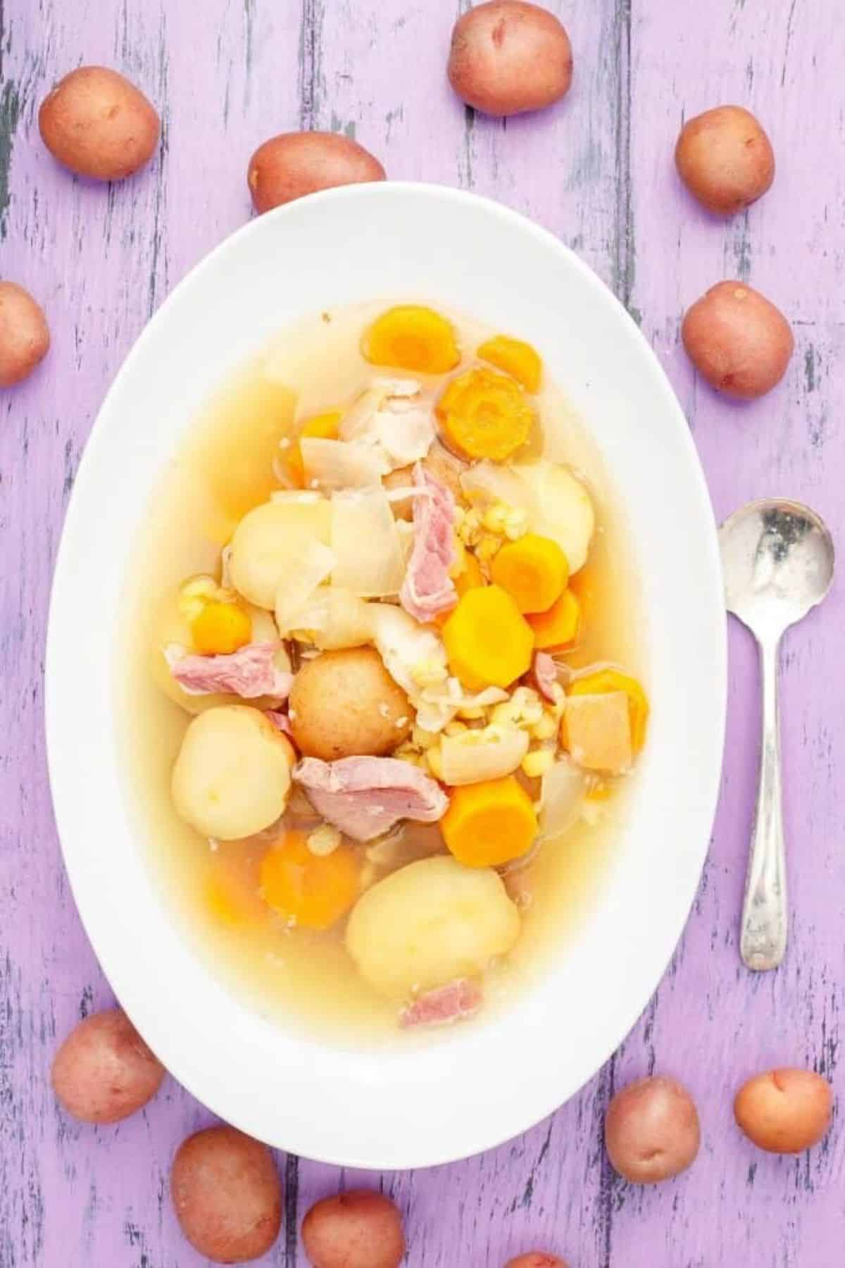 Tasty Slow Cooker Pea-Potato Soup on a white plate.